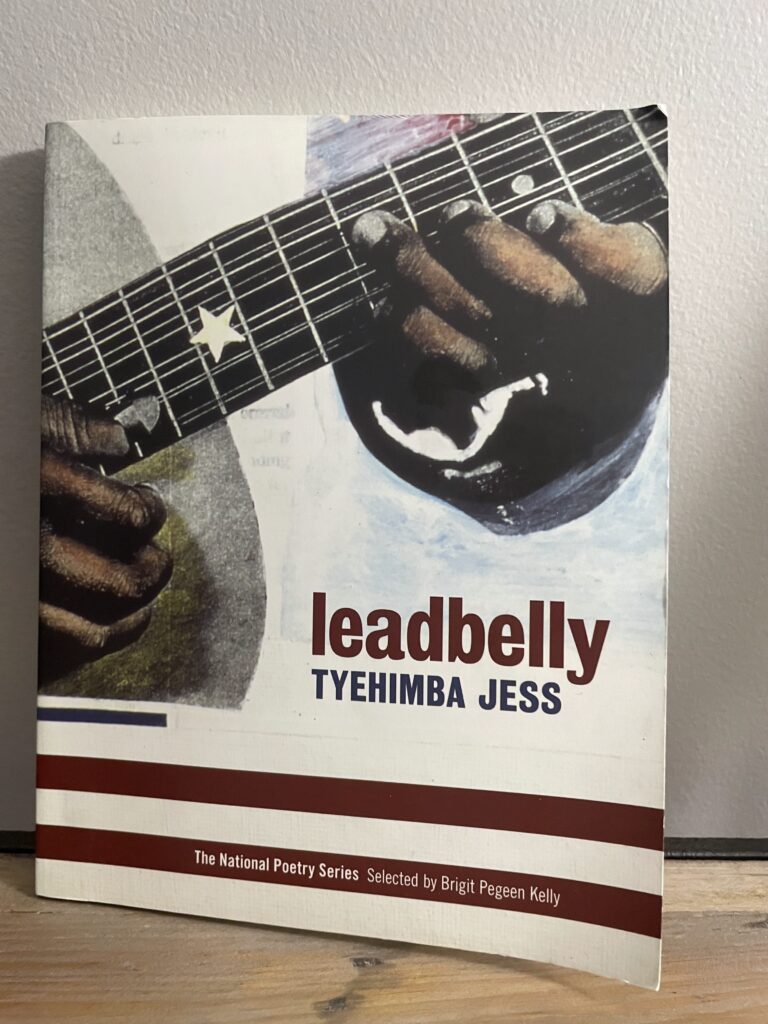 a book, leadbelly by Tyehimba Jess, on a shelf
