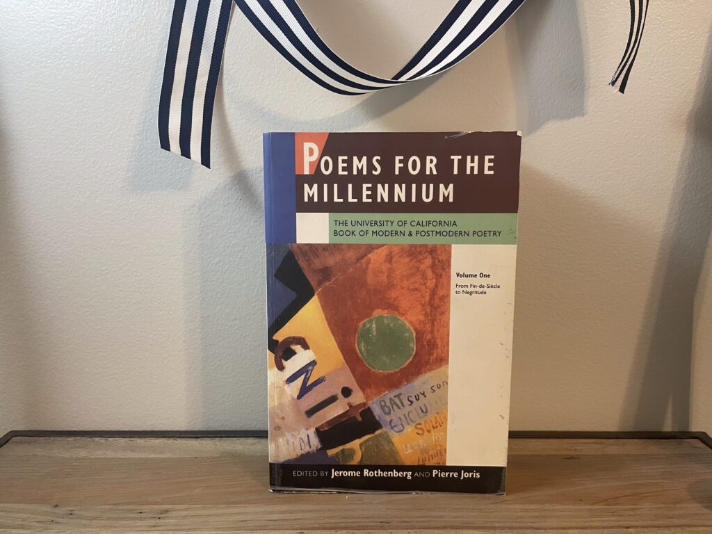 a book, Poems For The Millennium Vol I, on a shelf