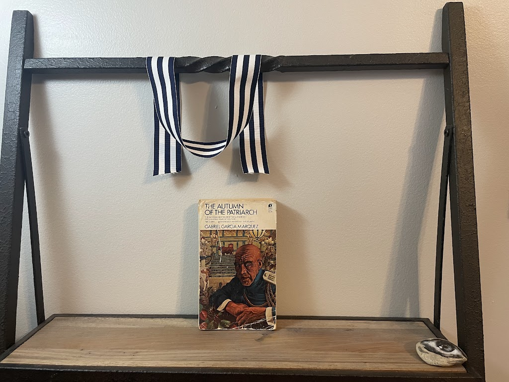 a book, THE AUTUMN OF THE PATRIARCH by Gabriel García Márquez, on a shelf